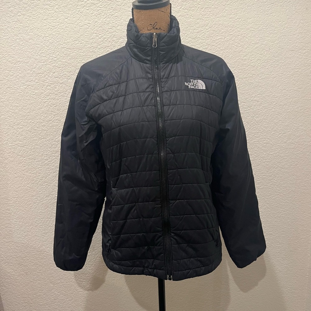 Women’s North Face puffer jacket size M